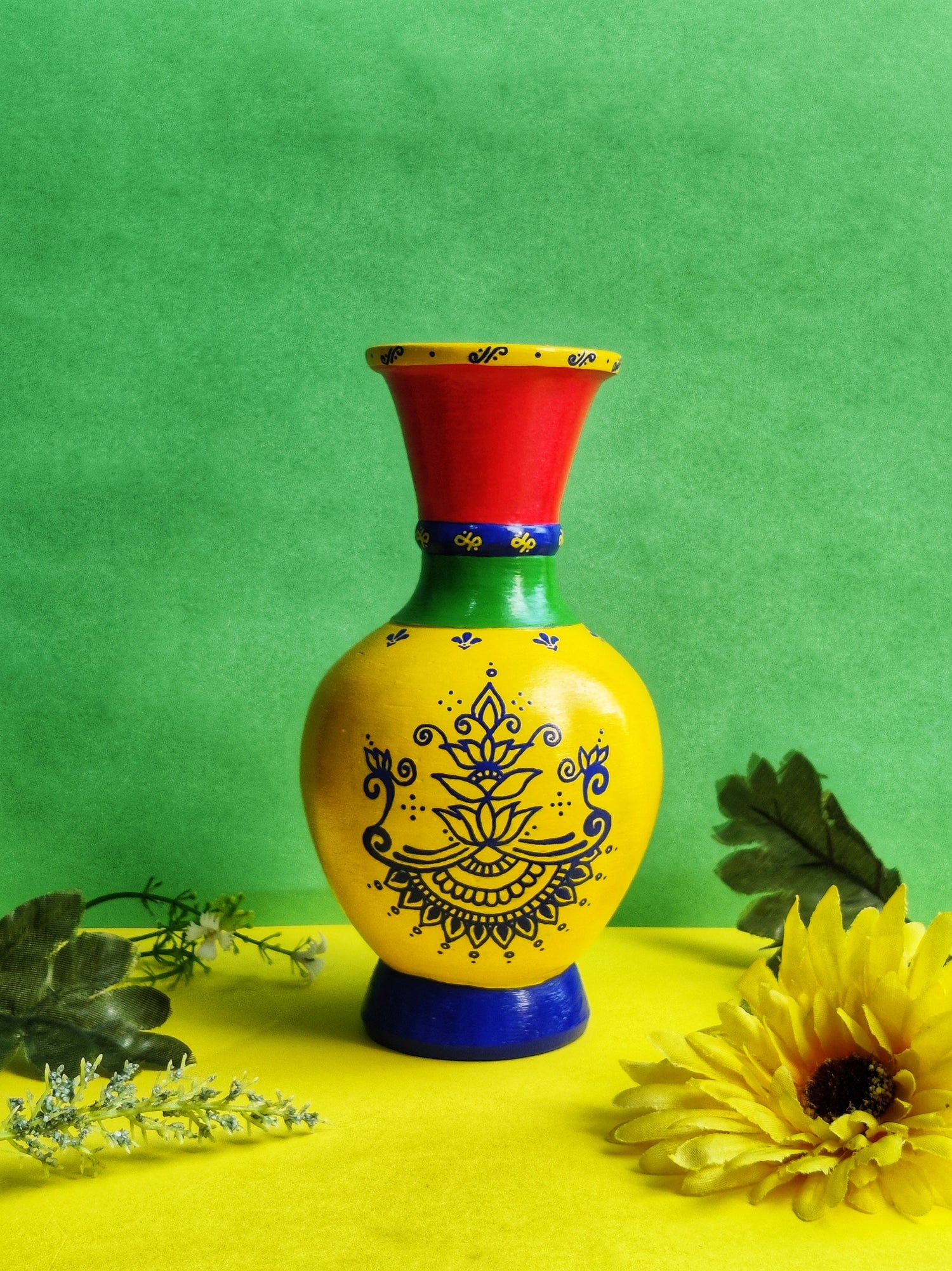 Brown and cream color flower vase with handpainted warli art