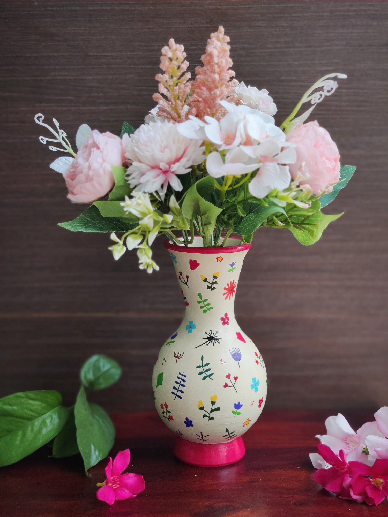 Brown and cream color flower vase with handpainted warli art